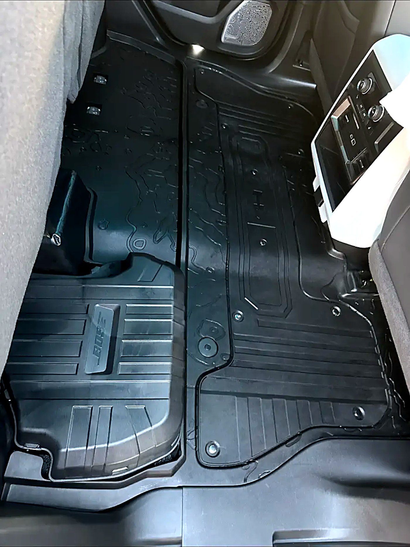 Truck rear floor liners scrubbed clean edge to edge