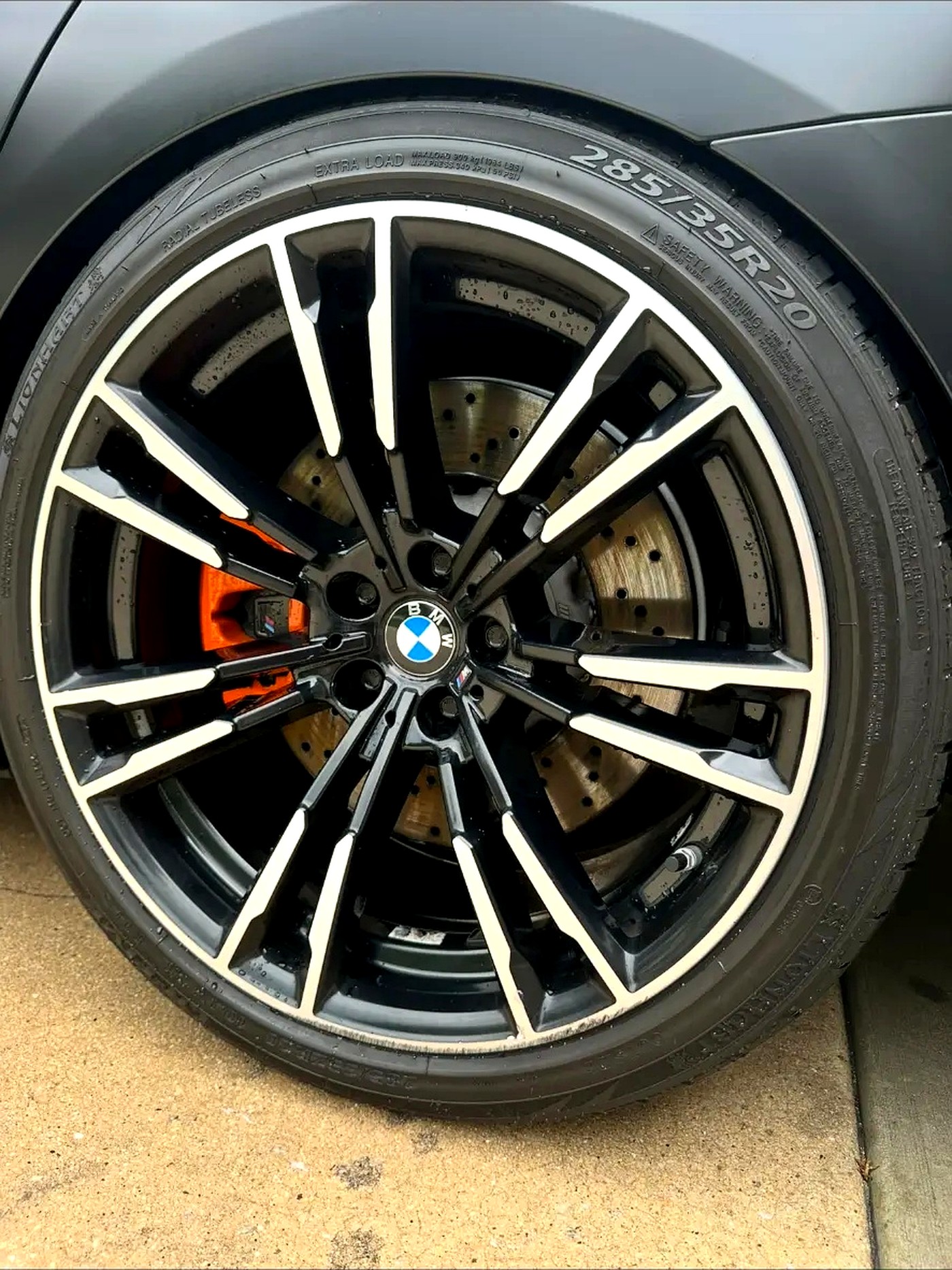 Clean grey BMW wheel and tire