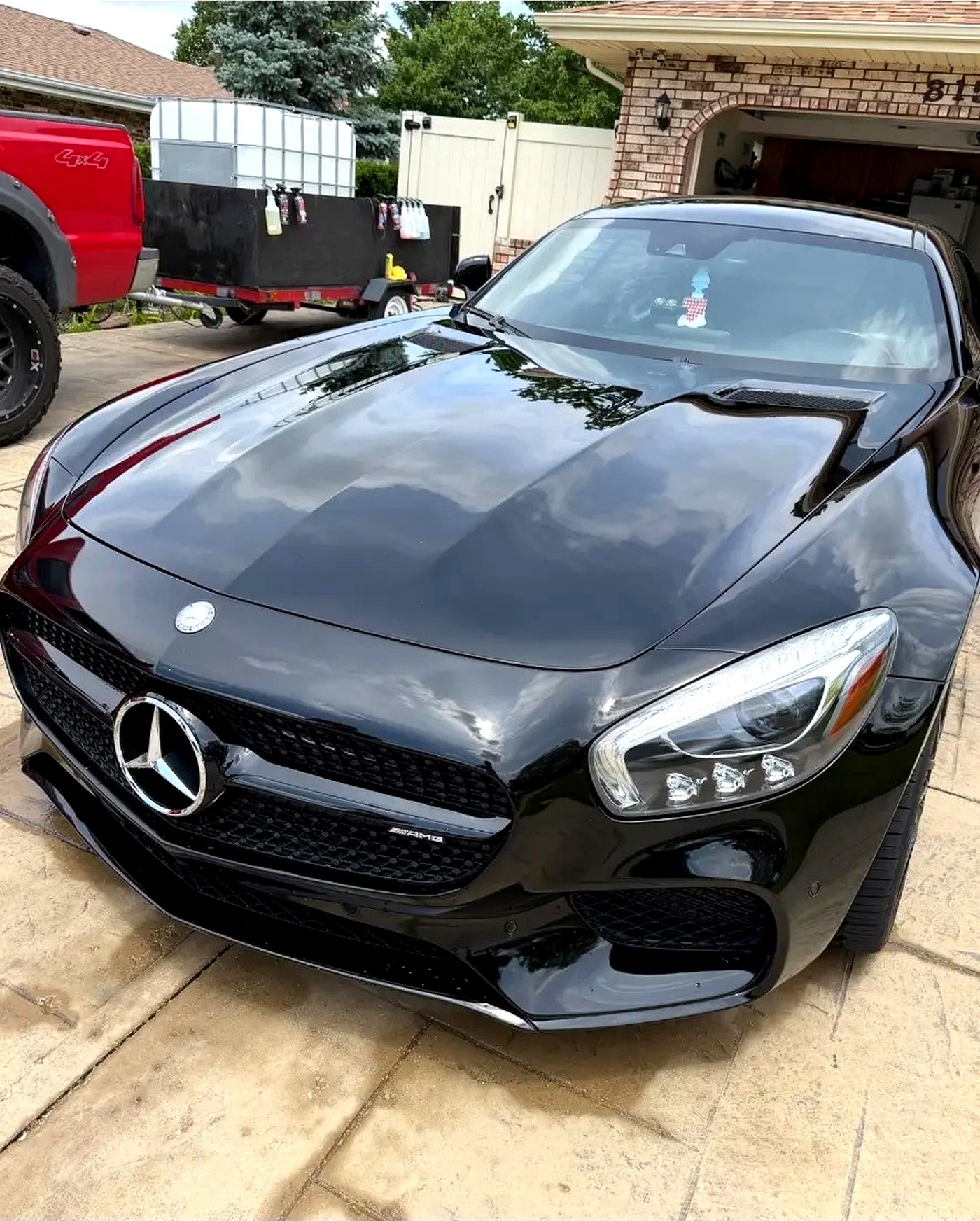 Reflective ceramic-coated black paint on an AMG GT
