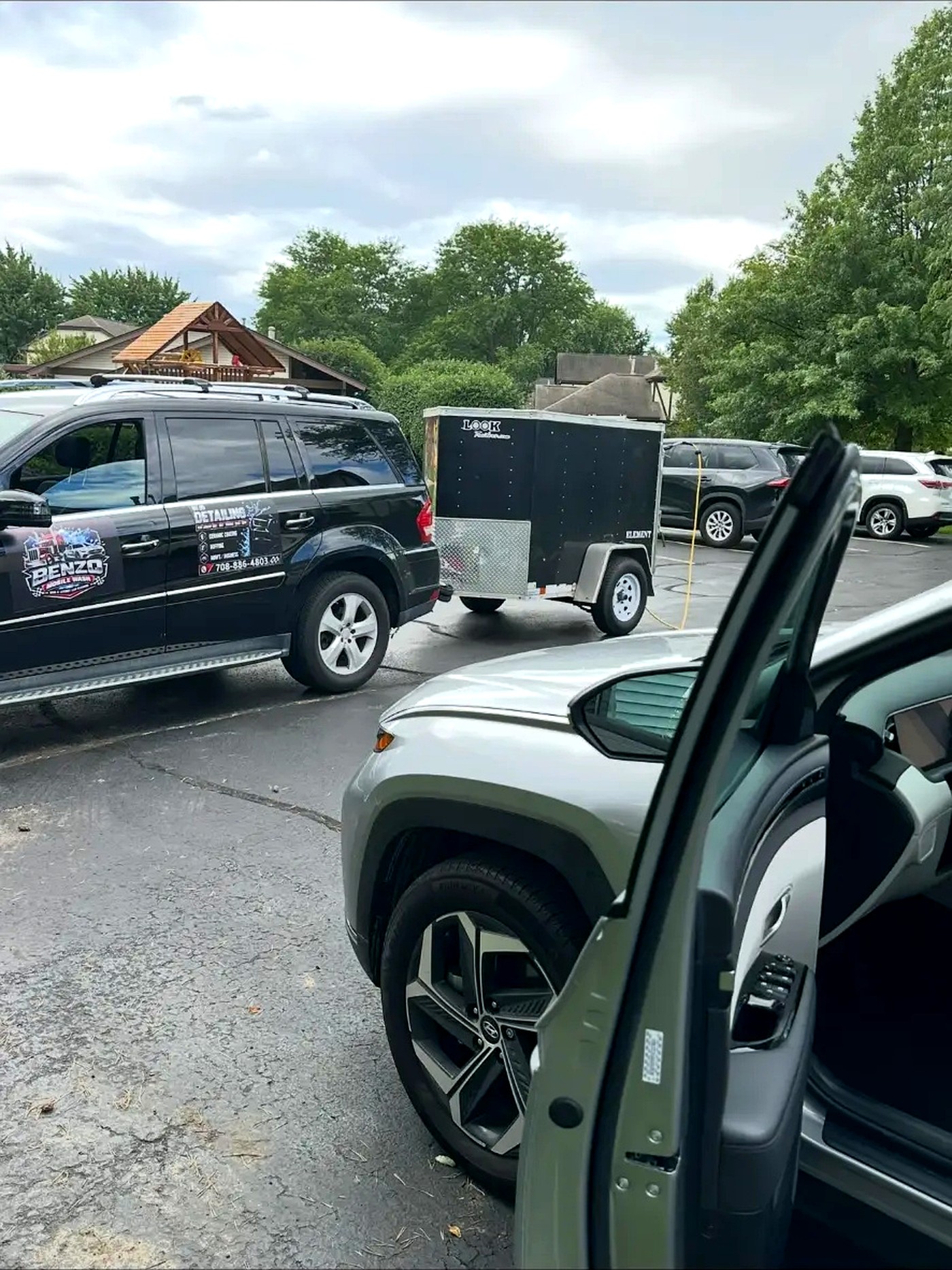 Benzo Mobile Wash detailing rig parked next to a customer vehicle